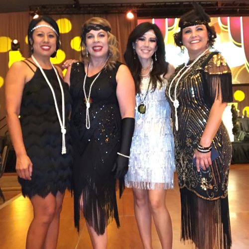 image of ladies posing at a gatsby event, photo taken with a roamer