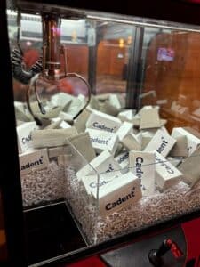 Image of branded prizes inside of a claw machine