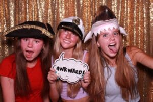 image of girls posing in a photo booth