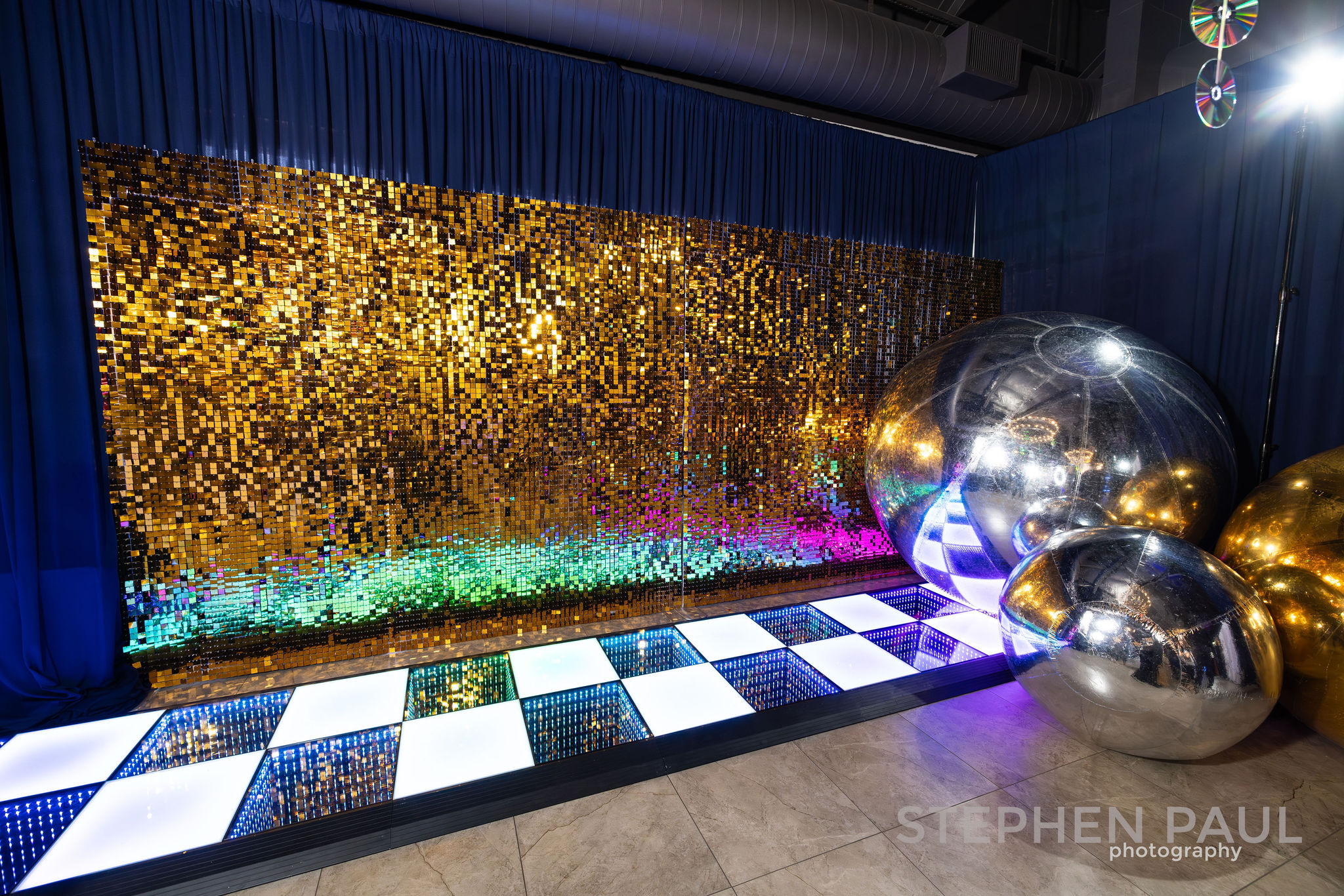 image of a shimmer wall with light up dance floor walkway