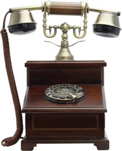 image of a wood antique phone
